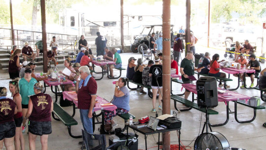 Many judges showed up to taste barbecue entries in spite of the heat. Photo by Hunter Dworaczyk